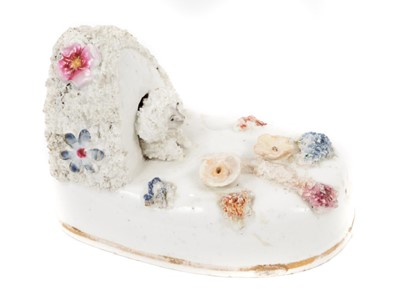 Lot 243 - Staffordshire porcelain model of a poodle in a kennel, circa 1840