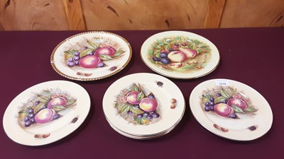 Lot 1219 - Aynsley Orchard Gold plate, signed D Jones, 26cm diameter, together with six smaller plates, signed by the same artist, 21cm diameter, and another plate, signed N Brunt, 26cm diameter (8)