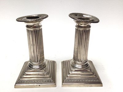 Lot 202 - Pair Victorian silver column candlesticks (London 1898)
