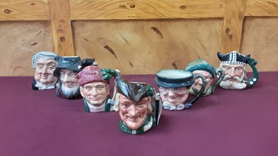 Lot 1254 - Collection of fifteen medium Royal Doulton character jugs to include Robin Hood, St George and The Lumberjack