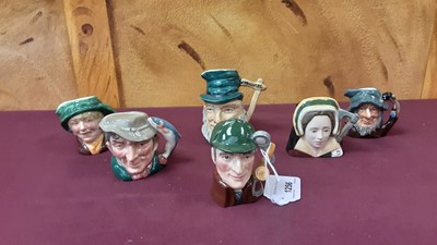 Lot 1256 - Collection of nineteen small Royal Doulton character jugs to include The Sleuth, The Guardsman and Catherine Howard, together with five other character jugs (24)