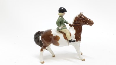Lot 1262 - Beswick girl on Pony, model no 1499