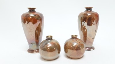 Lot 1296 - Pair of Wilkinson's Oriflamme lustre vases with fish decoration, 6.5cm high together with a larger pair with butterfly decoration, 15cm high (4)