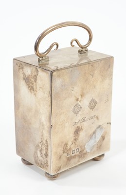 Lot 601 - Archibald Knox style silver carriage clock.