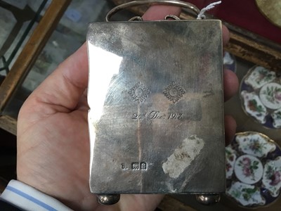 Lot 601 - Archibald Knox style silver carriage clock.
