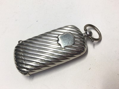 Lot 234 - Victorian silver combination vesta and sovereign case, (Birmingham 1897), maker William Neale & Co, 8.5cm in length