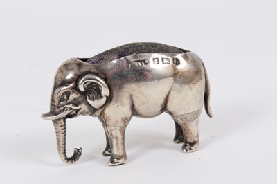 Lot 236 - Edwardian novelty pin cushion in the form of a standing Elephant, (Birmingham 1905), maker Adie & Lovekin Ltd, 4cm in length