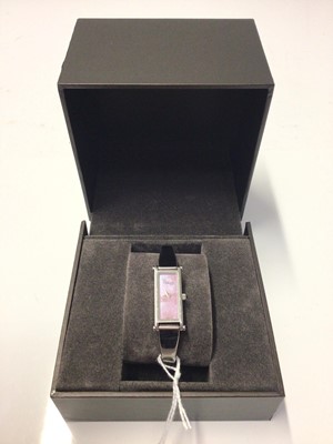 Lot 269 - Ladies Gucci 1500L wristwatch with pink mother of pearl dial in rectangular stainless steel case on stainless steel bracelet with signature clasp,  in original box