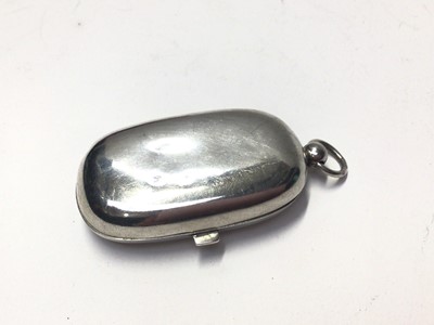 Lot 251 - George V silver double sovereign case of oval form, (Birmingham 1912), maker M. Emanuel, 6.5cm in length