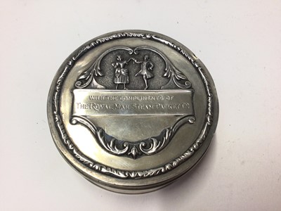 Lot 254 - George V silver box of circular form with hinged cover with embossed decoration and engraved 'with compliments of The Royal Mail Steam Packet Company', (Birmingham 1925), maker Elkington & Co. 7.5c...
