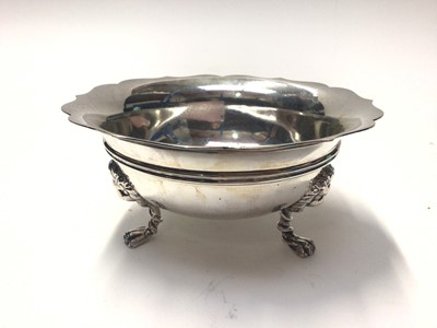 Lot 256 - Edwardian silver sugar bowl, raised on three feet, (London 1903), maker Frederick William Hentsch, 13.5cm in diameter, all at 8.2oz