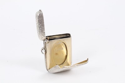 Lot 260 - Unusual Edwardian silver vesta case with hinged portrait frames to the front and rear, (Chester 1907), maker Smith & Bartlam, 5.7cm in length