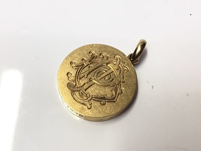 Lot 303 - Edwardian locket engraved 1883-1908 marked 18c and tests 18ct gold
