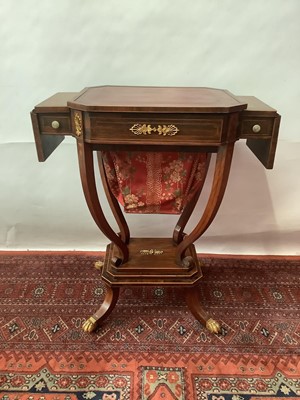 Lot 1396 - Good Regency rosewood combination writing/worktable the top and drop flaps crossbanded with tulipwood