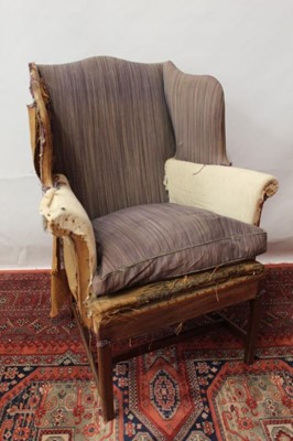 Lot 1401 - Small Georgian style wing chair of good proportions, standing on square legs