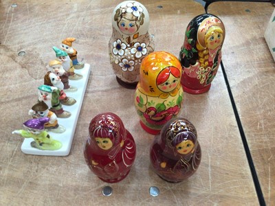 Lot 729 - Box of sundries including a Snow White toast rack, two wristwatches, Russian dolls etc