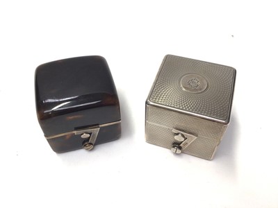 Lot 292 - George V silver travelling inkwell with engine turned decoration (London 1911), maker Goldsmiths and Silversmiths Company Ltd, together with a late Victorian tortoiseshell and silver travelling ink...