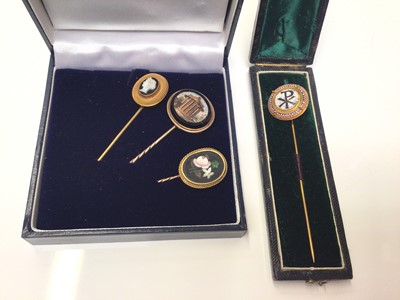Lot 316 - Group of four 19th century Italian stick pins to include two micromosaic stick pins, carved hardstone cameo stick pin and a pietra dura stick pin (4)