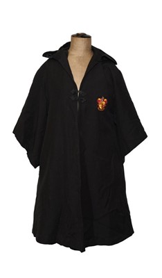 Lot 811 - Harry Potter interest - An original prop Gryffindor cloak from Harry Potter and the Goblet of Fire.  Provenance: Given to Alba Diaferia during a magical day on the Warner Brothers film set, arrange...