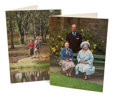 Lot 48 - H.M.Queen Elizabeth II and H.R.H.The Duke of Edinburgh, two signed 1984 and 1985 Christmas cards with twin gilt Royal ciphers to interiors and colour photograph of the Royal Couple to fronts (2)
