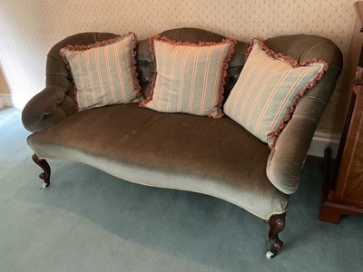 Lot 1240 - Victorian button upholstered serpentine settee, raised on cabriole legs and castors