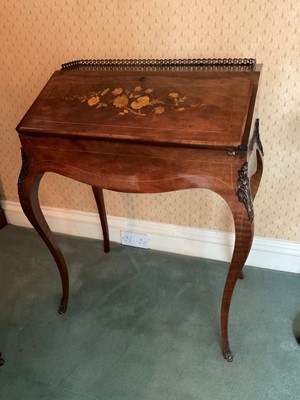 Lot 1241 - 19th century French marquetry inlaid mahogany bonheur du jour, with pierced brass gallery and shaped fall enclosing fitted interior on slender cabriole legs, 67cm wide x 46cm deep x 91cm high