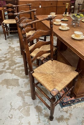 Lot 1254 - Set of eight 18th century style ladder back chairs, each with caned seat on turned understructure