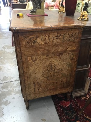 Lot 1257 - Impressive early 18th century Italian figured walnut crossbanded and marquetry inlaid commode, the top with shaped angles, over four drawers, each with early paper lining, on tapered feet, a note i...