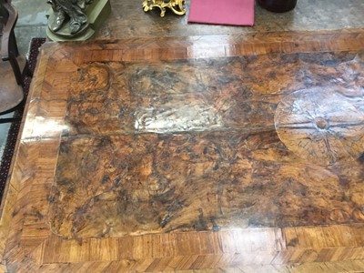 Lot 1257 - Impressive early 18th century Italian figured walnut crossbanded and marquetry inlaid commode, the top with shaped angles, over four drawers, each with early paper lining, on tapered feet, a note i...
