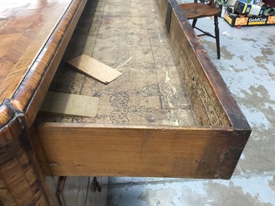 Lot 1257 - Impressive early 18th century Italian figured walnut crossbanded and marquetry inlaid commode, the top with shaped angles, over four drawers, each with early paper lining, on tapered feet, a note i...