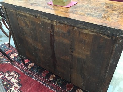 Lot 1257 - Impressive early 18th century Italian figured walnut crossbanded and marquetry inlaid commode, the top with shaped angles, over four drawers, each with early paper lining, on tapered feet, a note i...