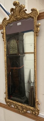 Lot 1261 - Queen Anne style gilt gesso wall mirror, with bevelled plate within moulded frame with Prince of Wales feathers cresting, 104 x 45cm