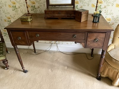 Lot 1263 - Late Regency mahogany dressing table, with three drawers to the shaped kneehole on ring turned legs, 120cm wide x 60cm deep x 78cm high