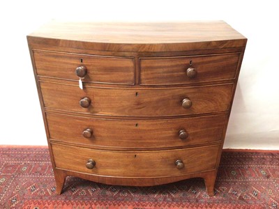 Lot 1267 - George IV mahogany bowfront chest, with two short over three long graduated drawers on splayed bracket feet, 106cm wide x 53cm deep x 106cm high