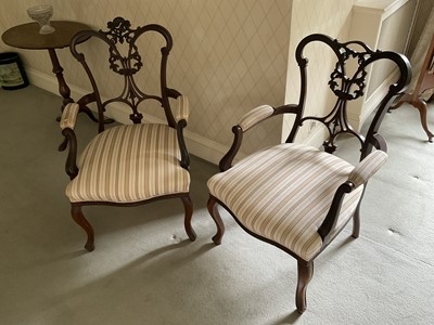 Lot 1272 - Pair of early 20th century mahogany open armchairs, with lattice backs on cabriole legs