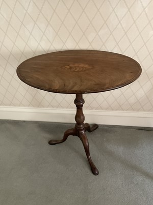 Lot 1274 - Regency oval topped mahogany occasional table, the tilt top with shell patera inlay on turned support and tripod base, 69cm wide