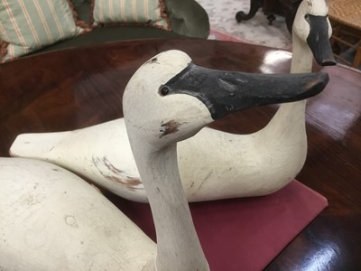 Lot 847 - Follower of Guy Taplin, pair of carved wood swans