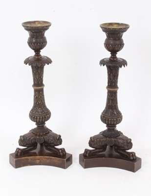 Lot 866 - Pair of bronze Grand Tour candlesticks