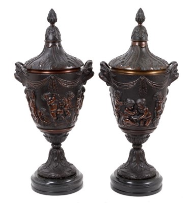 Lot 882 - Pair of impressive lidded bronze urns in the manner of Clodion