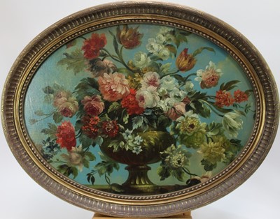 Lot 969 - Continental School, 19th century, oil on canvas laid on panel - stilllife profusion of summer flowers, oval, 44cm x 59cm, in gilt frame