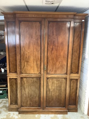 Lot 1382 - Good quality Edwardian inlaid mahogany breakfront wardrobe by Maple & Co. enclosed by two panelled doors with crossbanded decoration and inlaid stringing, 170cm wide x 216cm high x 48cm deep.