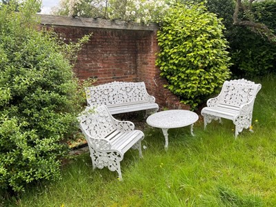 Lot 1389 - Victorian style white painted cast metal garden bench and a pair of matching chairs, together with a similar coffee table