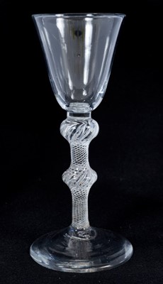 Lot 262 - 18th century wine glass with bell-shaped bowl, double knoped air twist stem on splayed foot 16 cm