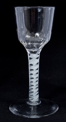 Lot 263 - 18th century wine glass with moulded bowl, double opaque twist stem on splayed foot 15cm