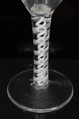 Lot 267 - 18th century wine glass with floral spray engraved bowl on double opaque twist stem on splayed foot 13cm