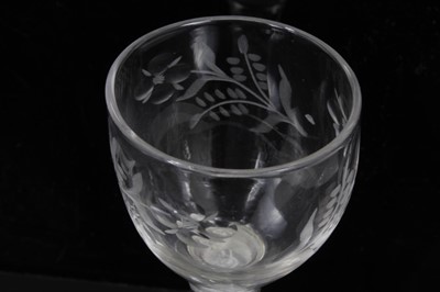 Lot 267 - 18th century wine glass with floral spray engraved bowl on double opaque twist stem on splayed foot 13cm
