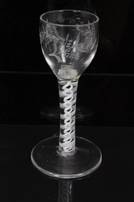 Lot 267 - 18th century wine glass with floral spray engraved bowl on double opaque twist stem on splayed foot 13cm