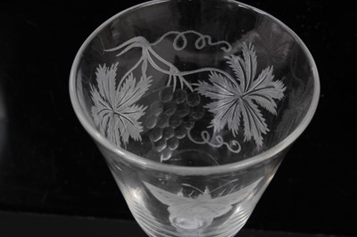 Lot 270 - 18th century wine glass with vine and butterfly engraved bowl, double opaque twist stem on splayed foot 15.6cm