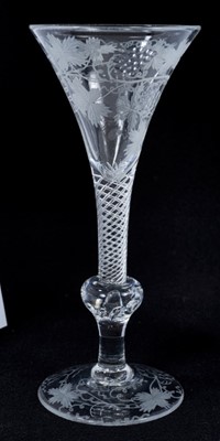 Lot 274 - Georgian-style wine glass with vine engraved decoration on air twist and knopped stem, ale flute with wrythern decoration and two other glasses (4)