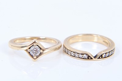 Lot 636 - Diamond single stone ring with a brilliant cut diamond weighing approximately 0.20cts in 9ct yellow gold setting, together with a matching eternity ring with 14 brilliant cut diamonds, both size G.